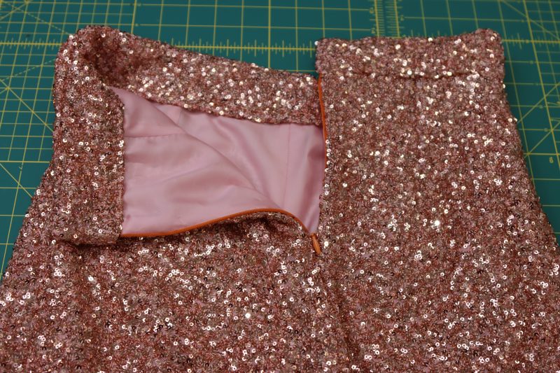 How To Sew Stitch In The Ditch To Connect The Inner Waistband - Gutermann Sew All Thread - Mood Fabrics - Morganite Waistcoat Ensemble Free Sewing Pattern Tutorial - MDF519 - Mood Fabrics Sewciety Blog - Sew a stitch in the ditch to connect the inner waistband.