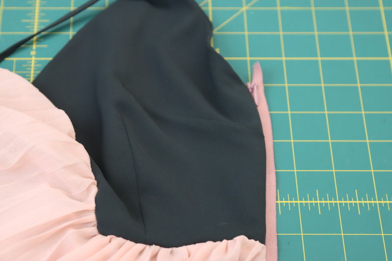 How To Flip Dress Right Sides Out - Invisible Zipper - Mood Fabrics - Pyrite Pleated Dress Free Sewing Pattern Tutorial - MDF527 - Mood Fabrics Sewciety Blog - Flip the dress right sides out.