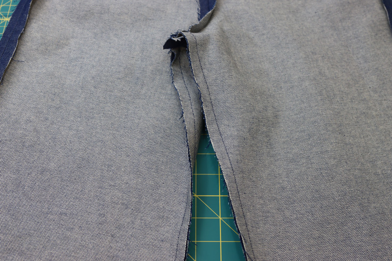 How To Pin Sew Pants Inseam - Cotton Denim Twill - Mood Fabrics - Merit Jumpsuit Free Sewing Pattern Tutorial - MDF525 - Mood Fabrics Sewciety Blog - Pin and sew the pants inseam.