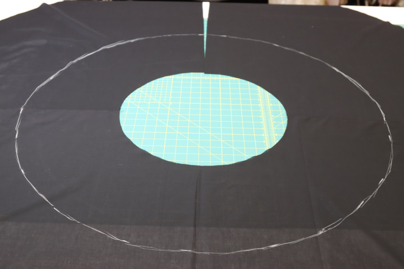 How To Mark Petticoat Ruffle Placement With Tailor’s Chalk - Cotton Voile - Mood Fabrics - Reims Soirée Dress Free Sewing Pattern Tutorial - MDF521 - Mood Fabrics Sewciety Blog - Mark the petticoat ruffle placement with tailor’s chalk.