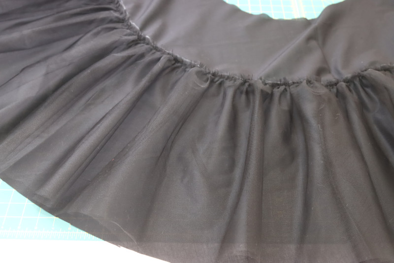 How To Sew Gathered Tulle To Chalk Line - Nylon Tulle - Mood Fabrics - Reims Soirée Dress Free Sewing Pattern Tutorial - MDF521 - Mood Fabrics Sewciety Blog - Sew the gathered tulle to the chalk line.