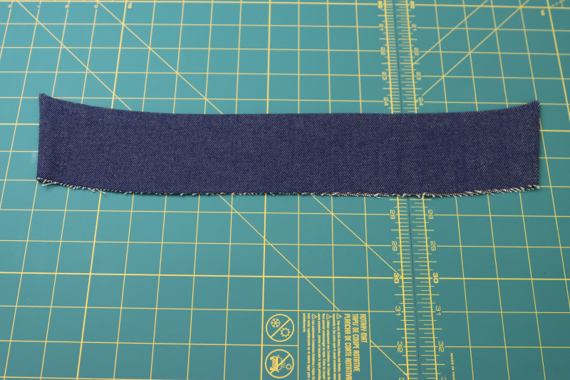 How To Flip Collar Flipped Right Side Out - Cotton Denim Twill - Mood Fabrics - Merit Jumpsuit Free Sewing Pattern Tutorial - MDF525 - Mood Fabrics Sewciety Blog - Flip the collar right sides out.