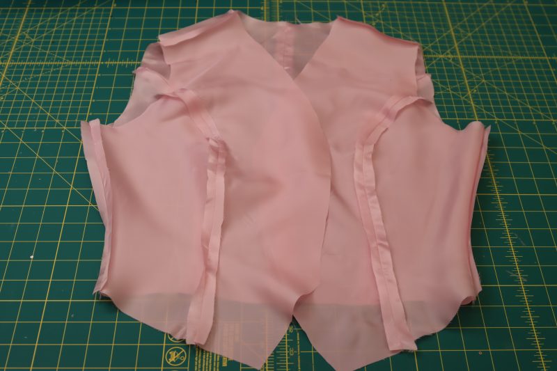 How To Pin Sew Side And Shoulder Seams Of The Lining - Twill Lining - Mood Fabrics - Morganite Waistcoat Ensemble Free Sewing Pattern Tutorial - MDF519 - Mood Fabrics Sewciety Blog - Pin and sew the side and shoulder seams of the lining.