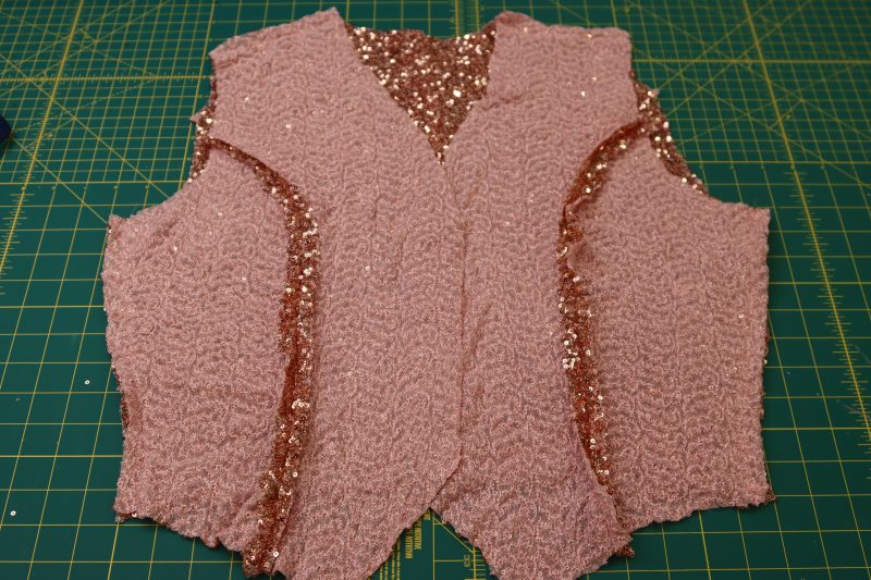 How To Pin Sew Side And Shoulder Seams Of The Vest - Baby Sequin Mesh - Mood Fabrics - Morganite Waistcoat Ensemble Free Sewing Pattern Tutorial - MDF519 - Mood Fabrics Sewciety Blog - Pin and sew the side and shoulder seams of the vest.