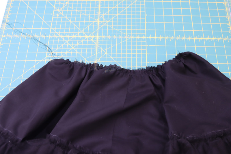 How To Gather Waistline Of Petticoat Lining Skirt - Cotton Voile - Mood Fabrics - Reims Soirée Dress Free Sewing Pattern Tutorial - MDF521 - Mood Fabrics Sewciety Blog - Gather the waistline of the petticoat lining skirt.