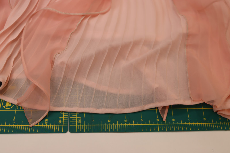 How To Hem Bottom Of Pleated Skirt - Accordion Pleated Chiffon - Mood Fabrics - Pyrite Pleated Dress Free Sewing Pattern Tutorial - MDF527 - Mood Fabrics Sewciety Blog - Hem the bottom of the pleated skirt.