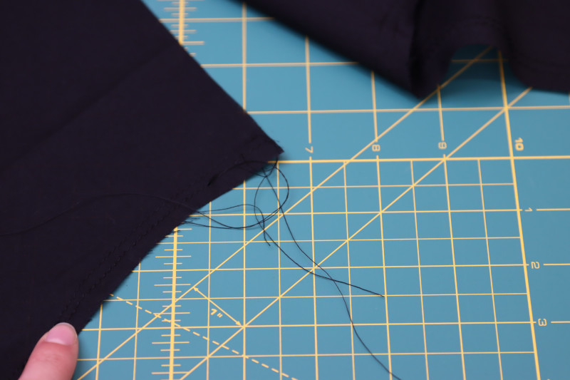 How To Sew Gathering Stitches Along Waistline Of Petticoat Lining Skirt - Cotton Voile - Mood Fabrics - Reims Soirée Dress Free Sewing Pattern Tutorial - MDF521 - Mood Fabrics Sewciety Blog - Sew gathering stitches along the waistline of the petticoat lining skirt.