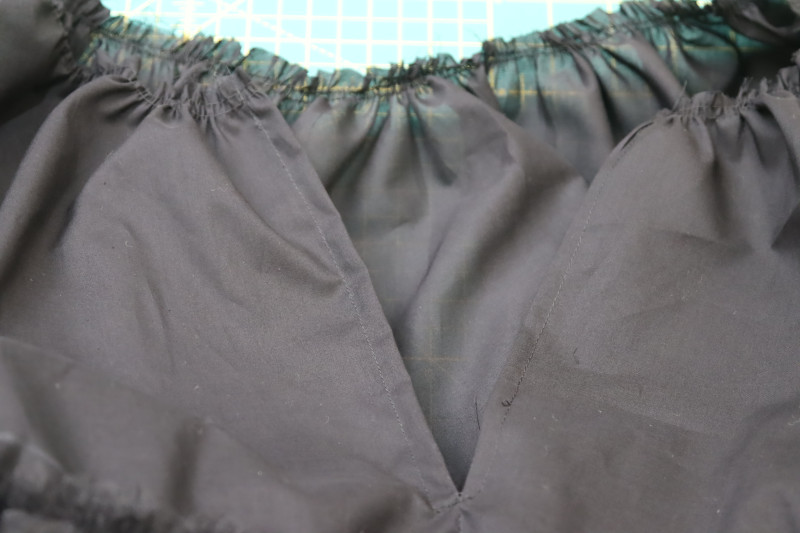 How To Topstitch Over Seam Allowance At Center Back Slit - Cotton Voile - Mood Fabrics - Reims Soirée Dress Free Sewing Pattern Tutorial - MDF521 - Mood Fabrics Sewciety Blog - Topstitch over the seam allowance at the center back slit.