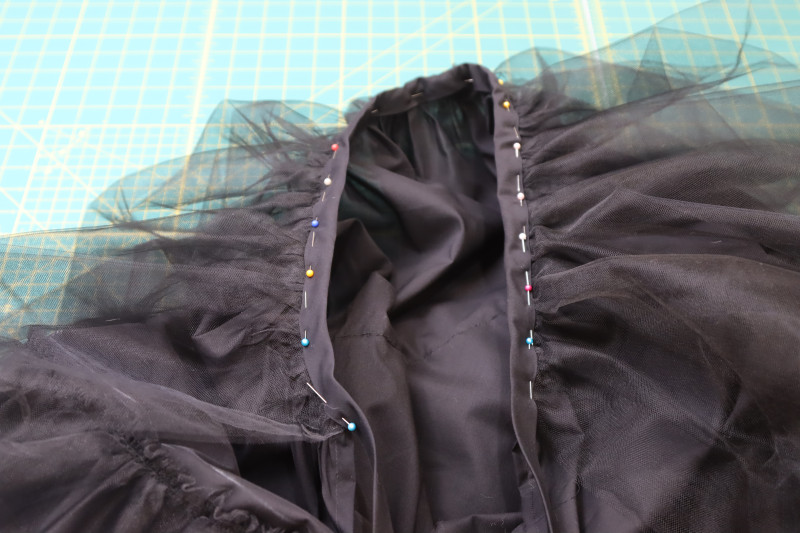 How To Pin Sew Waistband To Petticoat Lining Skirt - Cotton Voile - Mood Fabrics - Reims Soirée Dress Free Sewing Pattern Tutorial - MDF521 - Mood Fabrics Sewciety Blog - Pin and sew the waistband to the petticoat lining skirt.