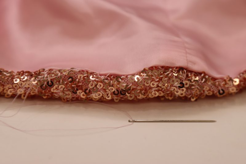 How To Sew Ladder Stitch To Close The Gap In The Hem - Gutermann Sew All Thread - Mood Fabrics - Morganite Waistcoat Ensemble Free Sewing Pattern Tutorial - MDF519 - Mood Fabrics Sewciety Blog - Sew a ladder stitch to close the gap in the hem.