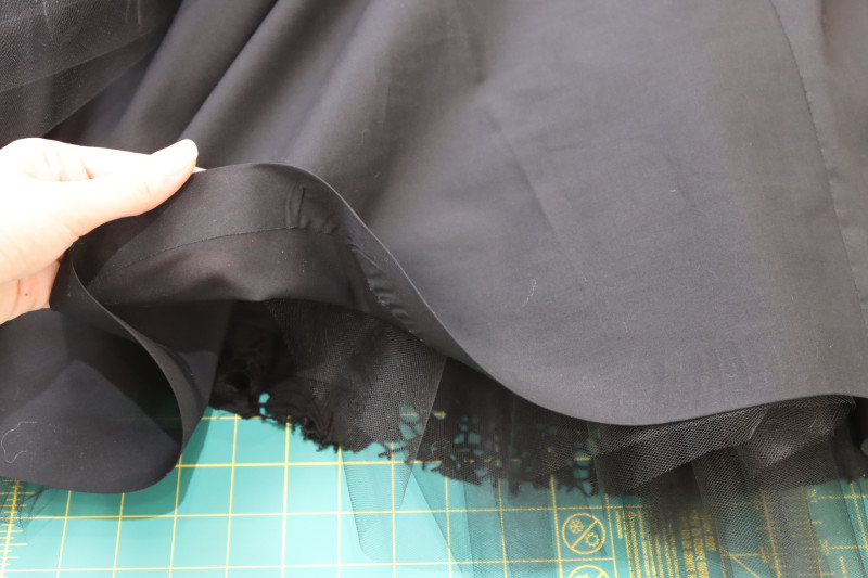 How To Hem Petticoat Lining Skirt With Fusible Hem Tape - Cotton Voile - Mood Fabrics - Reims Soirée Dress Free Sewing Pattern Tutorial - MDF521 - Mood Fabrics Sewciety Blog - Hem the petticoat lining skirt with fusible hem tape.