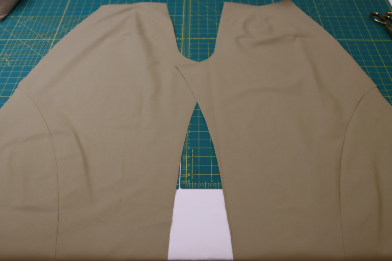 How To Press Back Panel Seams Open And Flat - Stretch Khaki Twill - Mood Fabrics - Lucca Tailored Barrel Leg Pants Free Sewing Pattern Tutorial - MDF524 - Mood Fabrics Sewciety Blog - Press the back panel seams open and flat.