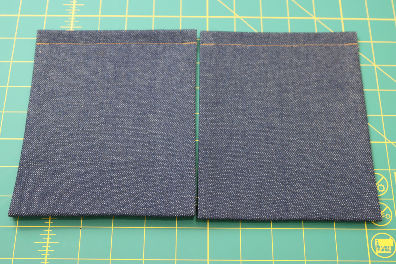 How To Topstitch Back Pocket Top Edge Topstitched Gold Thread - Gutermann Sew All Thread - Mood Fabrics - Merit Jumpsuit Free Sewing Pattern Tutorial - MDF525 - Mood Fabrics Sewciety Blog - Topstitch the top folded edge of the back pocket with the gold contrast thread.