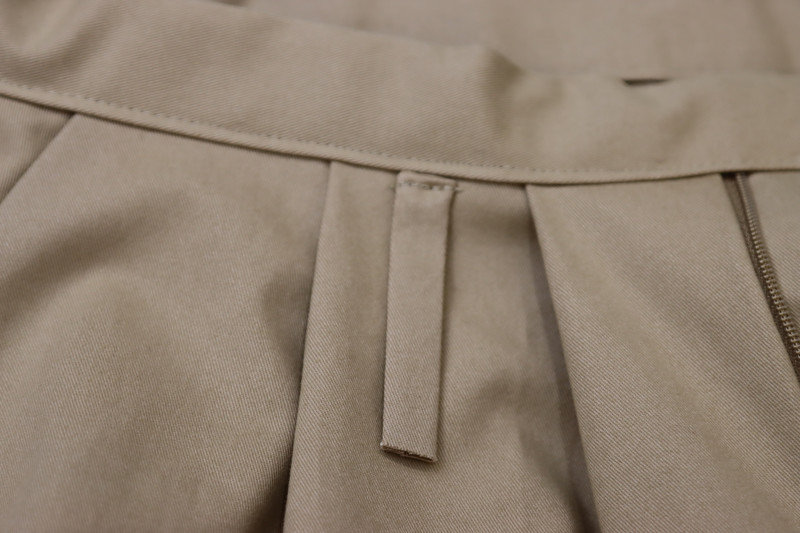 How To Sew One End Of Belt Loop Directly Under Waistband - Gutermann Sew All Thread - Mood Fabrics - Lucca Tailored Barrel Leg Pants Free Sewing Pattern Tutorial - MDF524 - Mood Fabrics Sewciety Blog - Sew one end of the belt loop directly under the waistband.