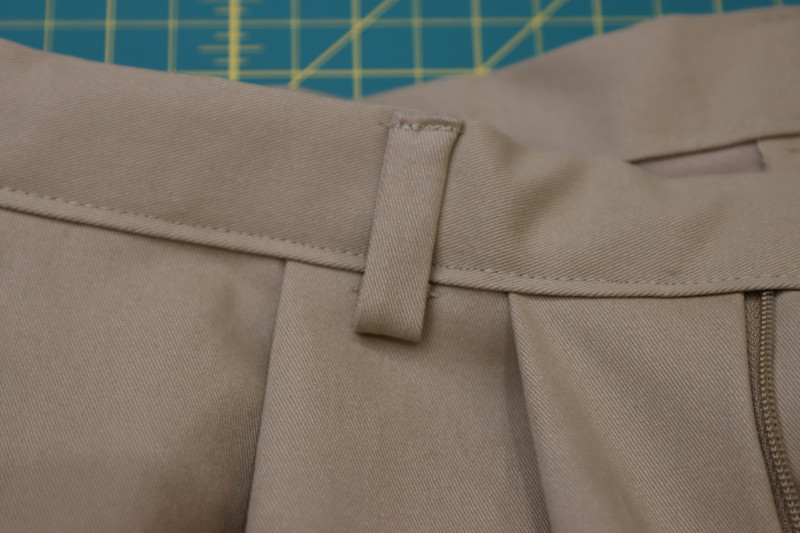 How To Sew Other End Of Belt Loop To Top Of Waistband - Gutermann Sew All Thread - Mood Fabrics - Lucca Tailored Barrel Leg Pants Free Sewing Pattern Tutorial - MDF524 - Mood Fabrics Sewciety Blog - Sew the other end of the belt loop to the top of the waistband.