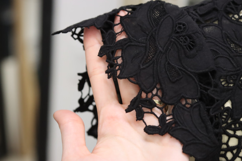How To Trim Raw Edges Of Lace To Reveal Floral Motifs - Floral Guipure Lace - Mood Fabrics - Reims Soirée Dress Free Sewing Pattern Tutorial - MDF521 - Mood Fabrics Sewciety Blog - Trim the raw edges of the lace to reveal the floral motifs.