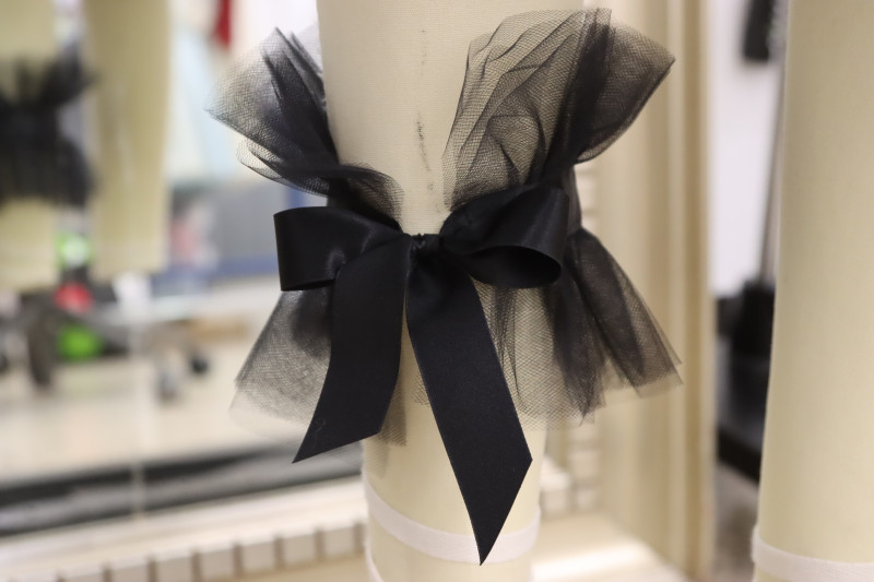 How To Tie Tulle Cuffs Around Ankle - Satin Ribbon - Mood Fabrics - Reims Soirée Dress Free Sewing Pattern Tutorial - MDF521 - Mood Fabrics Sewciety Blog - Tie the tulle cuffs around the ankle.
