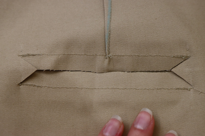 How To Cut Slit In Between Welts As Shown In Photo - Stretch Khaki Twill - Mood Fabrics - Lucca Tailored Barrel Leg Pants Free Sewing Pattern Tutorial - MDF524 - Mood Fabrics Sewciety Blog - Cut a slit in between the welts as shown in the photo.