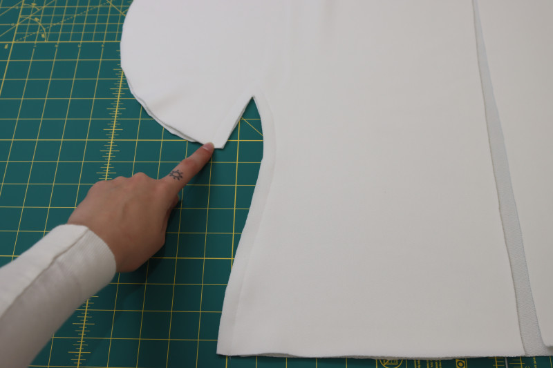 How To Pin Sew Sleeve Inseams And Side Seams - Stretch Liverpool Knit - Mood Fabrics - Merano Balloon Sleeve Blouse Free Sewing Pattern Tutorial - MDF522 - Mood Fabrics Sewciety Blog - Pin and sew the sleeve inseams and side seams.