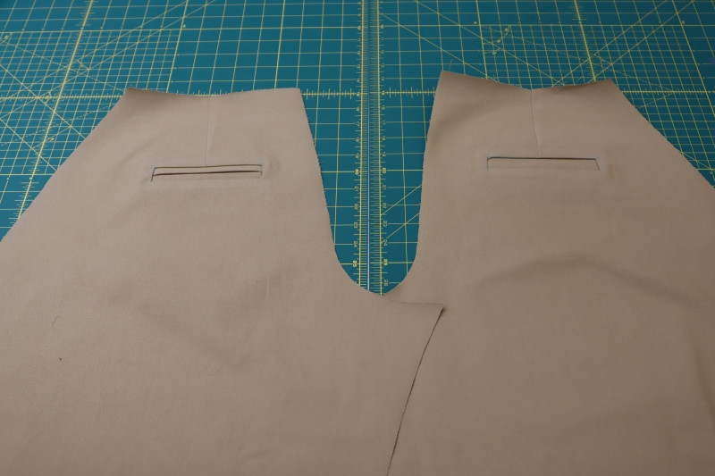 How To Press Both Welts Into Place - Stretch Khaki Twill - Mood Fabrics - Lucca Tailored Barrel Leg Pants Free Sewing Pattern Tutorial - MDF524 - Mood Fabrics Sewciety Blog - Press both welts into place.