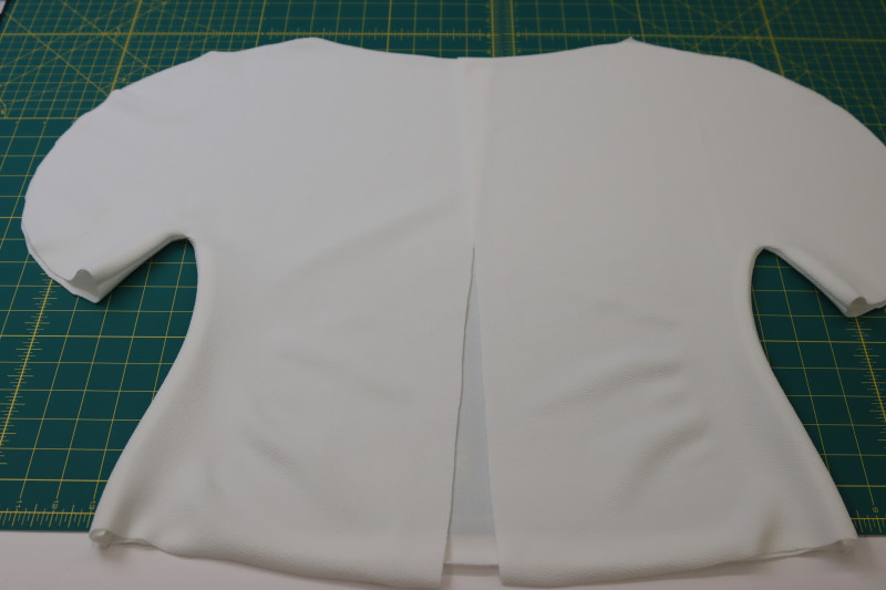 How To Press Side Seams Open And Flat - Stretch Liverpool Knit - Mood Fabrics - Merano Balloon Sleeve Blouse Free Sewing Pattern Tutorial - MDF522 - Mood Fabrics Sewciety Blog - Press the side seams open and flat.