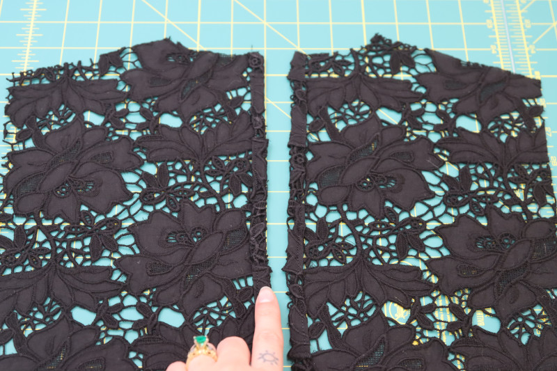 How To Sew Rolled Hem At Center Back Of Top Back Pieces - Floral Guipure Lace - Mood Fabrics - Reims Soirée Dress Free Sewing Pattern Tutorial - MDF521 - Mood Fabrics Sewciety Blog - Sew a rolled hem at the center back of the top back pieces.