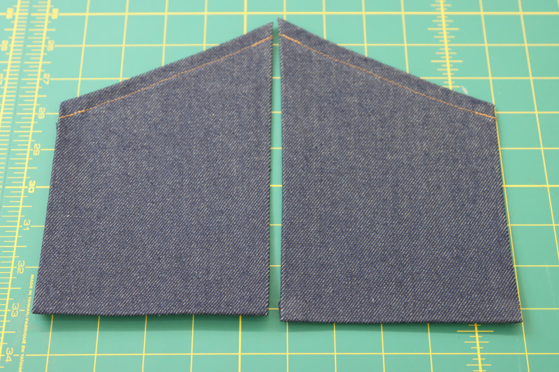 How To Topstitch Front Pocket Top Edge Topstitched Gold Thread - Gutermann Sew All Thread - Mood Fabrics - Merit Jumpsuit Free Sewing Pattern Tutorial - MDF525 - Mood Fabrics Sewciety Blog - Topstitch the top folded edge of the front pocket with the gold contrast thread.