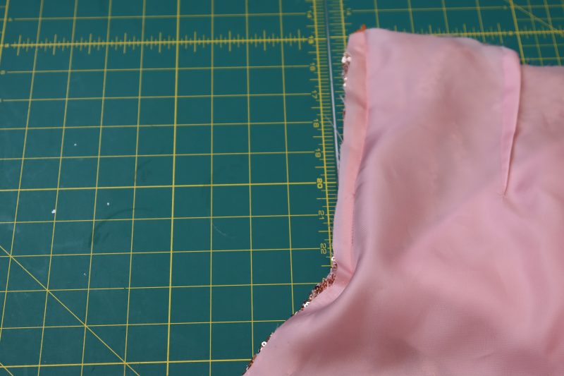 How To Sew Opposite Side Of Zipper Tape - Invisible Zipper - Mood Fabrics - Morganite Waistcoat Ensemble Free Sewing Pattern Tutorial - MDF519 - Mood Fabrics Sewciety Blog - Sew the opposite side of the zipper tape.