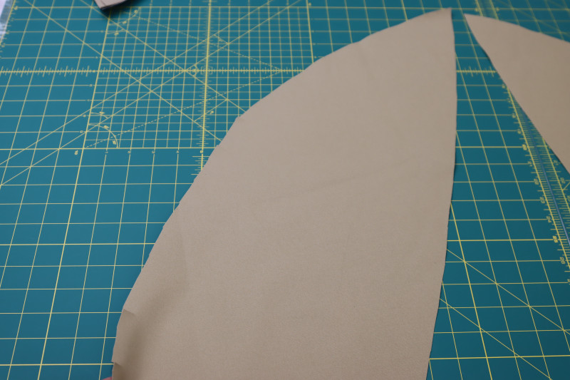 How To Cut Notches For Pleats On Front Pants Panels - Stretch Khaki Twill - Mood Fabrics - Lucca Tailored Barrel Leg Pants Free Sewing Pattern Tutorial - MDF524 - Mood Fabrics Sewciety Blog - Cut the notches for the pleats on the front pants panels.