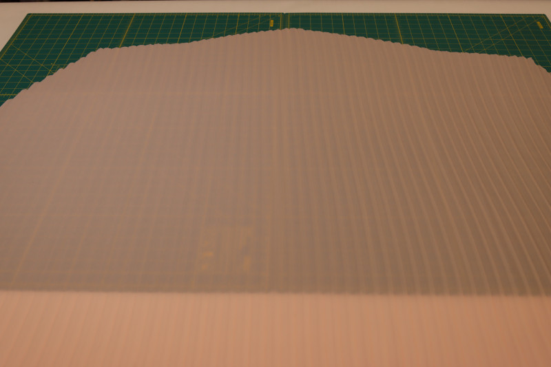 How To Layout Back Skirt Piece Right Sides Up - Accordion Pleated Chiffon - Mood Fabrics - Pyrite Pleated Dress Free Sewing Pattern Tutorial - MDF527 - Mood Fabrics Sewciety Blog - Layout the back skirt piece right sides up.