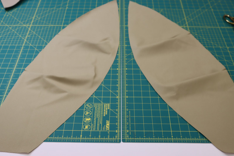 How To Pin Sew Pleats On Front Pants Panels - Stretch Khaki Twill - Mood Fabrics - Lucca Tailored Barrel Leg Pants Free Sewing Pattern Tutorial - MDF524 - Mood Fabrics Sewciety Blog - Pin and sew the pleats on the front pants panels.