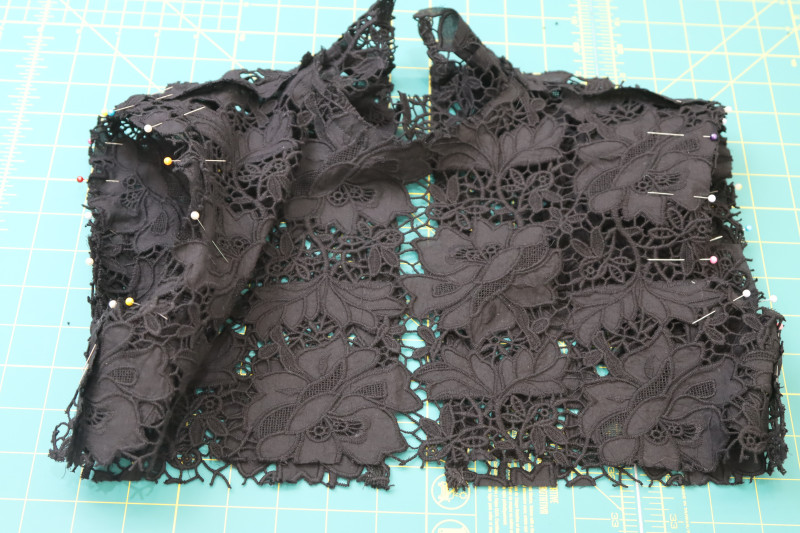 How To Pin Sleeve Caps Into Armscyes Right Sides Together - Floral Guipure Lace - Mood Fabrics - Reims Soirée Dress Free Sewing Pattern Tutorial - MDF521 - Mood Fabrics Sewciety Blog - Pin the sleeve caps into the armscyes, right sides together.