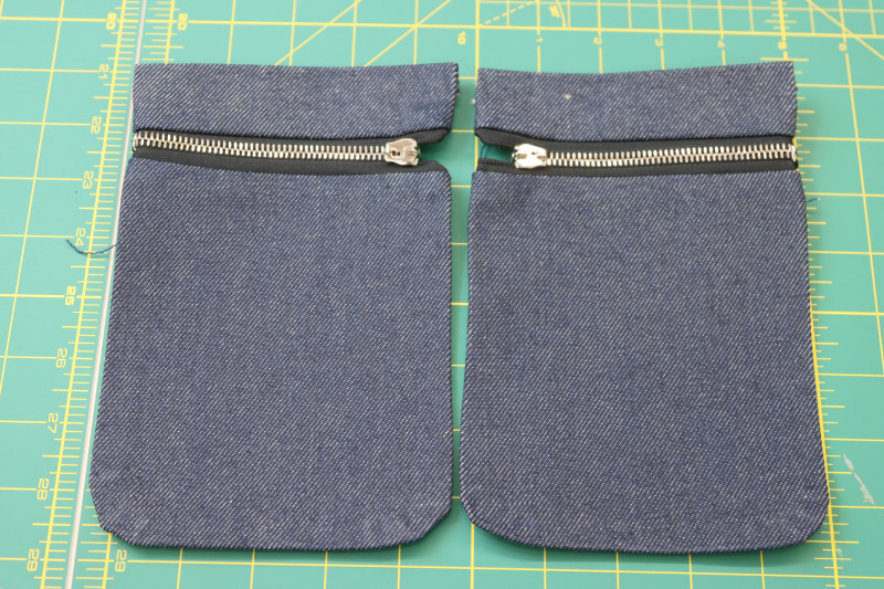 How To Press Breast Pocket Seam Allowances Pressed - 9 Inch Zipper - Mood Fabrics - Merit Jumpsuit Free Sewing Pattern Tutorial - MDF525 - Mood Fabrics Sewciety Blog - Press all the breast pocket seam allowances again.