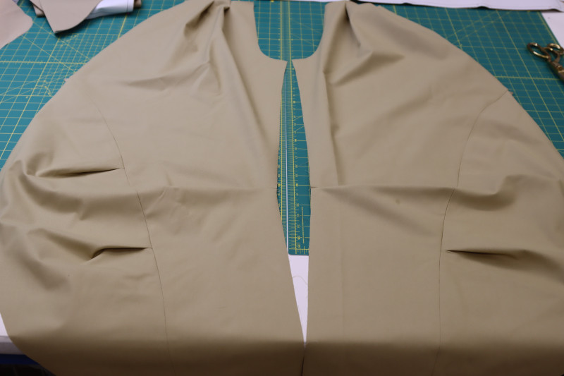 How To Press Front Panel Seams Open And Flat - Stretch Khaki Twill - Mood Fabrics - Lucca Tailored Barrel Leg Pants Free Sewing Pattern Tutorial - MDF524 - Mood Fabrics Sewciety Blog - Press the front panel seams open and flat.