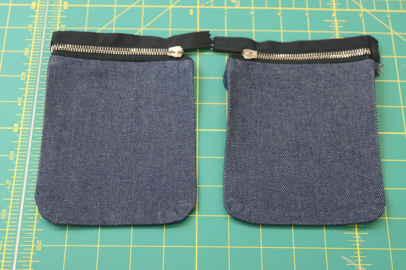 How To Press Zippers Pressed Away From Pockets - 9 Inch Zipper - Mood Fabrics - Merit Jumpsuit Free Sewing Pattern Tutorial - MDF525 - Mood Fabrics Sewciety Blog - Press the zippers away from the breast pockets.