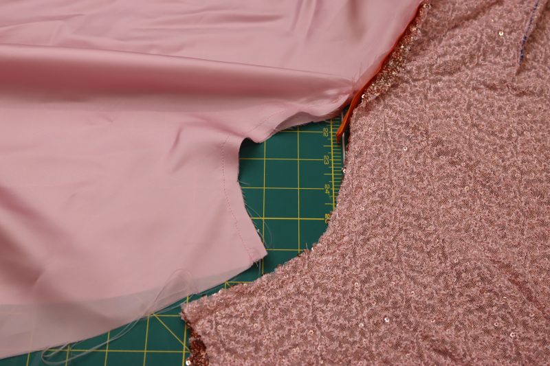How To Sew Back Crotch Seams Under The Zipper - Baby Sequin Mesh - Mood Fabrics - Morganite Waistcoat Ensemble Free Sewing Pattern Tutorial - MDF519 - Mood Fabrics Sewciety Blog - Sew the back crotch seams under the zipper.