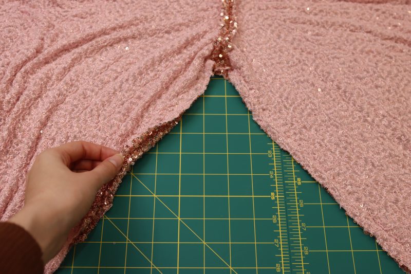 How To Pin Sew Main Fabric Inseam - Baby Sequin Mesh - Mood Fabrics - Morganite Waistcoat Ensemble Free Sewing Pattern Tutorial - MDF519 - Mood Fabrics Sewciety Blog - Pin and sew the main fabric inseam.