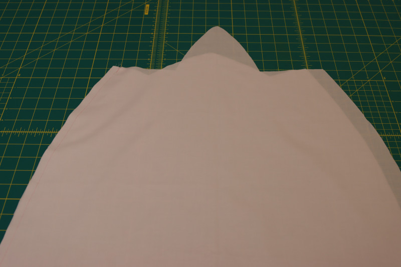 How To Pin Sew One Lining Skirt Side Seam - Japanese Pima Cotton Lawn - Mood Fabrics - Pyrite Pleated Dress Free Sewing Pattern Tutorial - MDF527 - Mood Fabrics Sewciety Blog - Pin and sew one of the lining skirt side seams.