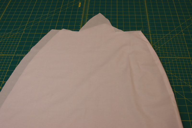 How To Press Lining Skirt Side Seam Open And Flat - Japanese Pima Cotton Lawn - Mood Fabrics - Pyrite Pleated Dress Free Sewing Pattern Tutorial - MDF527 - Mood Fabrics Sewciety Blog - Press the lining skirt side seam open and flat.