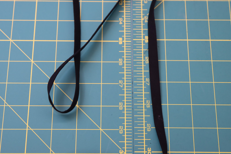 How To Flip Bias Cut Tube Right Sides Out With Loop Turner - Cotton Voile - Mood Fabrics - Reims Soirée Dress Free Sewing Pattern Tutorial - MDF521 - Mood Fabrics Sewciety Blog - Flip the bias cut tube right sides out with a loop turner.
