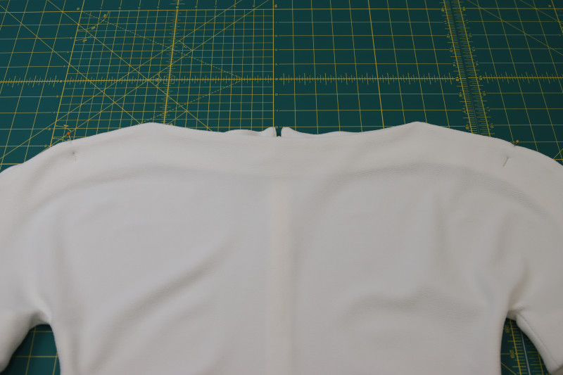 How To Mark Ends Of The Shoulders With Pins - Stretch Liverpool Knit - Mood Fabrics - Merano Balloon Sleeve Blouse Free Sewing Pattern Tutorial - MDF522 - Mood Fabrics Sewciety Blog - Mark the ends of the shoulders with pins.