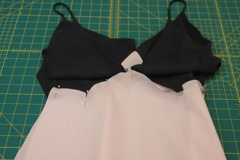 How To Pin Back Lining Skirt To Back Bodice Lining - Japanese Pima Cotton Lawn - Mood Fabrics - Pyrite Pleated Dress Free Sewing Pattern Tutorial - MDF527 - Mood Fabrics Sewciety Blog - Pin the back skirt lining to the back bodice lining.