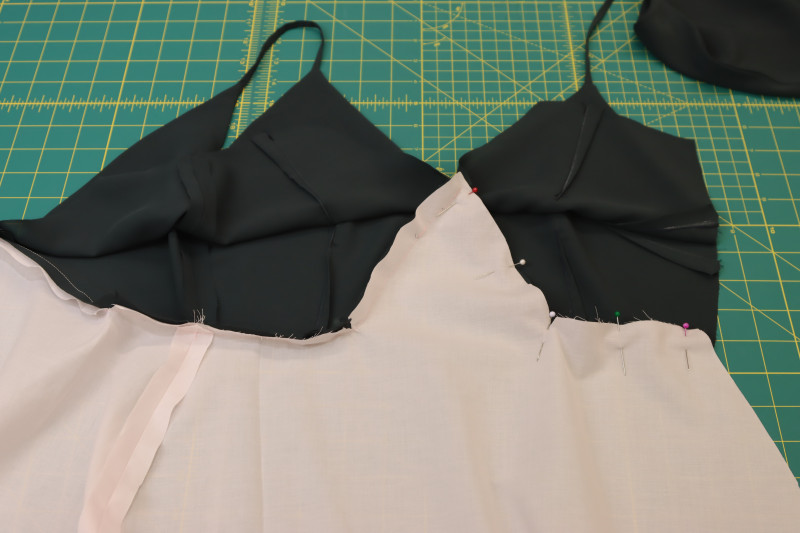 How To Pin Front Lining Skirt To Front Bodice Lining - Japanese Pima Cotton Lawn - Mood Fabrics - Pyrite Pleated Dress Free Sewing Pattern Tutorial - MDF527 - Mood Fabrics Sewciety Blog - Pin the front lining skirt to the front bodice lining.