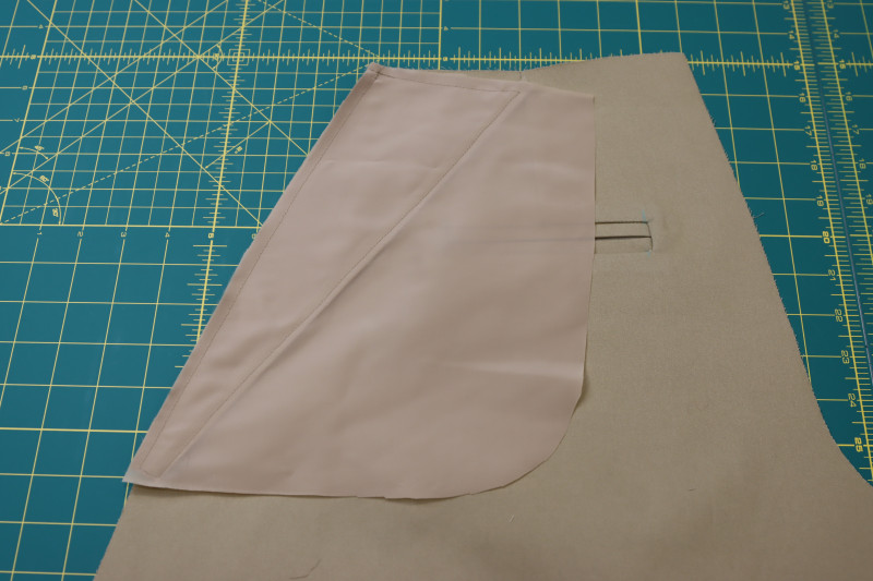 How To Pin Sew B Pocket Bags To Back Pants Pieces - Stretch Polester Twill Lining - Mood Fabrics - Lucca Tailored Barrel Leg Pants Free Sewing Pattern Tutorial - MDF524 - Mood Fabrics Sewciety Blog - Pin and sew the B pocket bags to the back pants pieces.