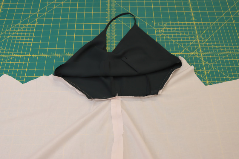 How To Pin Sew Skirt Lining To Bodice Lining At Side Seam - Japanese Pima Cotton Lawn - Mood Fabrics - Pyrite Pleated Dress Free Sewing Pattern Tutorial - MDF527 - Mood Fabrics Sewciety Blog - Pin and sew the skirt lining to the bodice lining at the side seam.