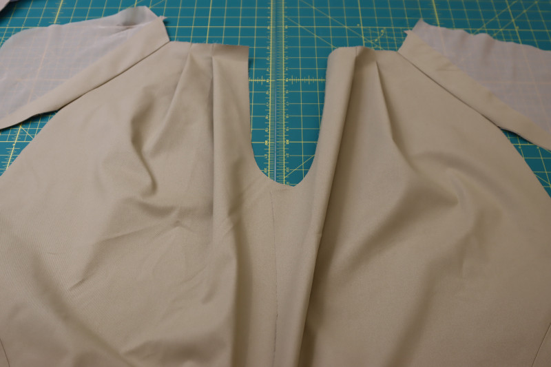 How To Press Pocket Seams Open And Flat - Stretch Khaki Twill - Mood Fabrics - Lucca Tailored Barrel Leg Pants Free Sewing Pattern Tutorial - MDF524 - Mood Fabrics Sewciety Blog - Press the pocket seams open and flat.