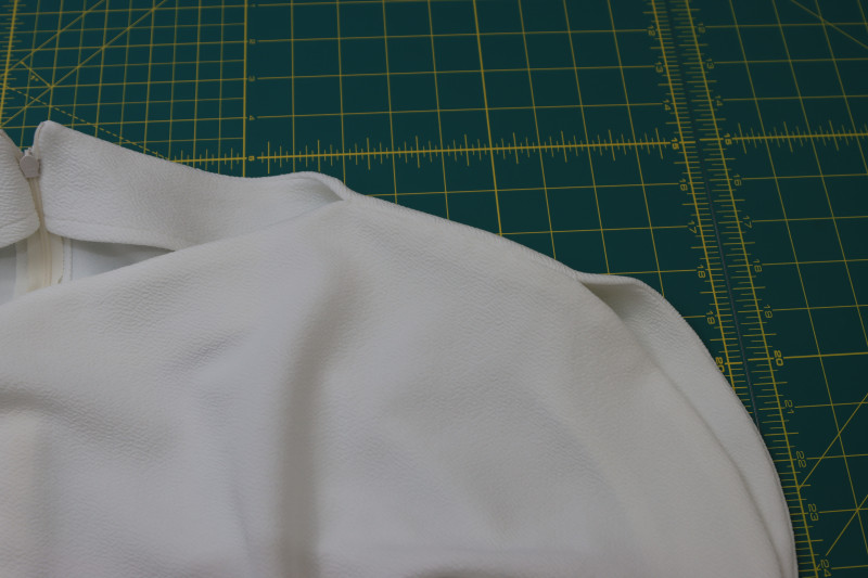 How To Tie Off The Hand Stitching - Gutermann Sew All Thread - Mood Fabrics - Merano Balloon Sleeve Blouse Free Sewing Pattern Tutorial - MDF522 - Mood Fabrics Sewciety Blog - Tie off the hand stitching.