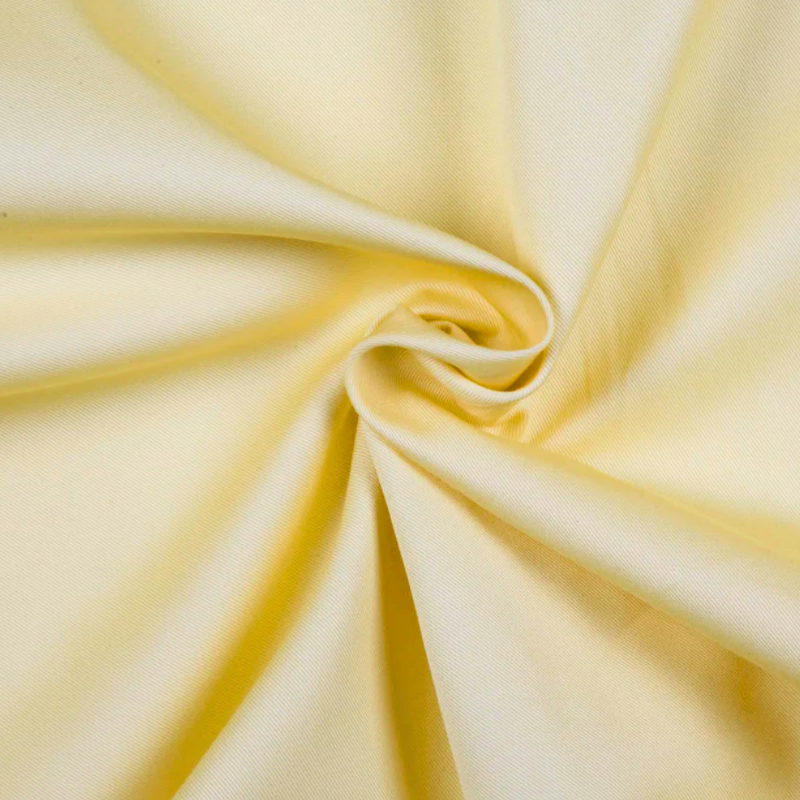 Organic Cotton Twill - Sun - Stratton Collection fabric perfect for Free Corset Sewing Projects such as the The Madison Tea Length Dress Sewing Pattern free PDF download from Mood Fabrics Sewciety Blog.