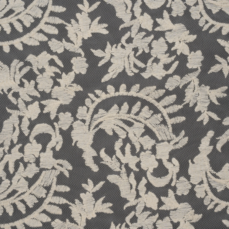 Embroidered Lace - Ivory Floral Crescents - Deadstock fabric perfect for Free Transitional Spring Sewing Projects such as the Taiga Trapeze Skirt Sewing Pattern free PDF download from Mood Fabrics Sewciety Blog.
