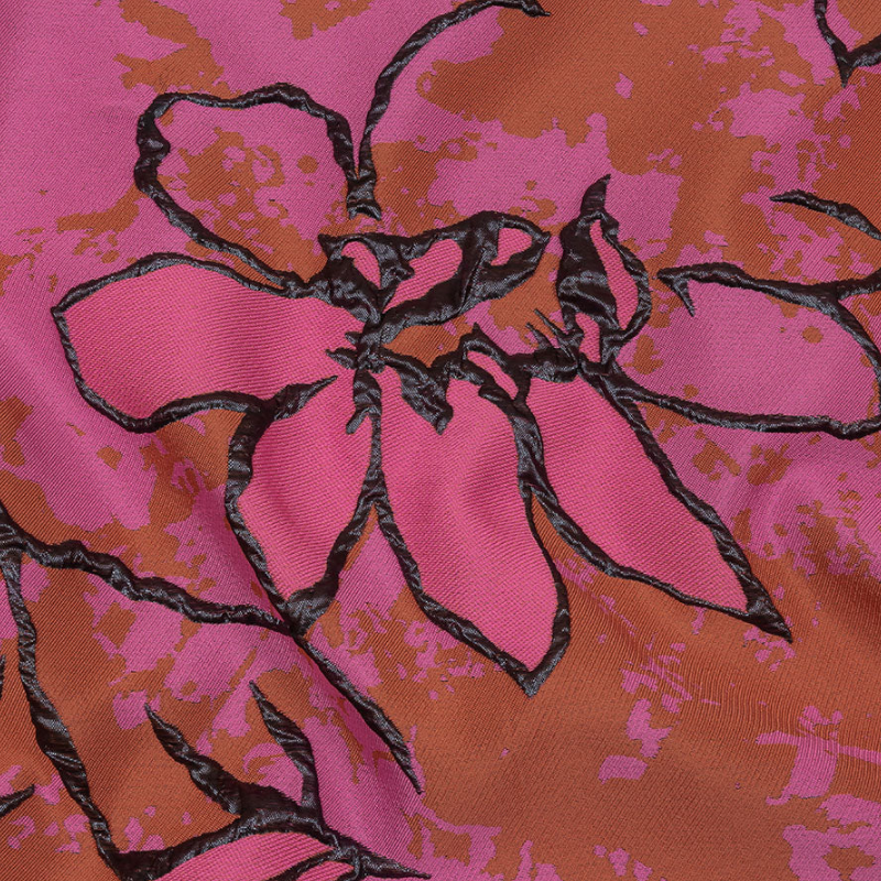 Metallic Black, Pink and Orange Mottled Floral Outlines Luxury Brocade fabric perfect for Free Transitional Spring Sewing Projects such as the Marilla Top Sewing Pattern free PDF download from Mood Fabrics Sewciety Blog.